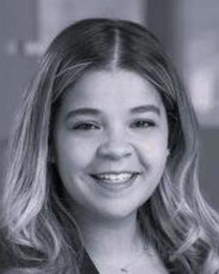 headshot of woman smiling