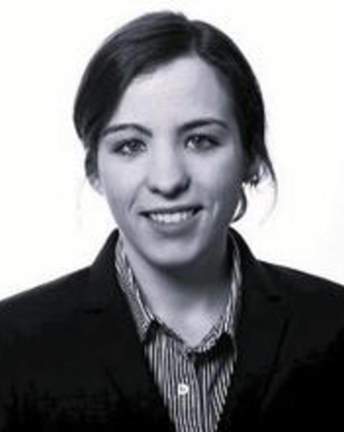 headshot of dark haired woman